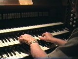 Old man playing Church Organ