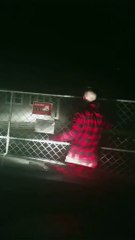 Stumbling Husband Barely Manages to Help Open Gate