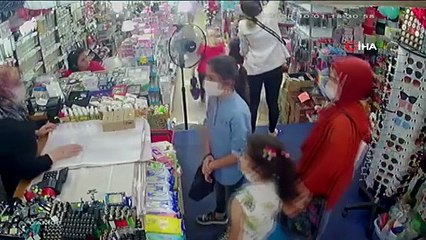 Alışveriş yapmak için gittiği mağazada beğendiği avize kafasına düştü