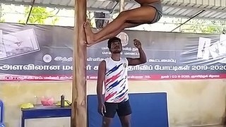 Performing a complete Forward summer salto from the Pole - Tamizhan Mallakhamb Sports Academy