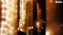 Huge fire engulfs 33-storey block of flats - Residents escape to roof