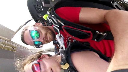Skydivers Get Stuck on Plane's Landing Gear