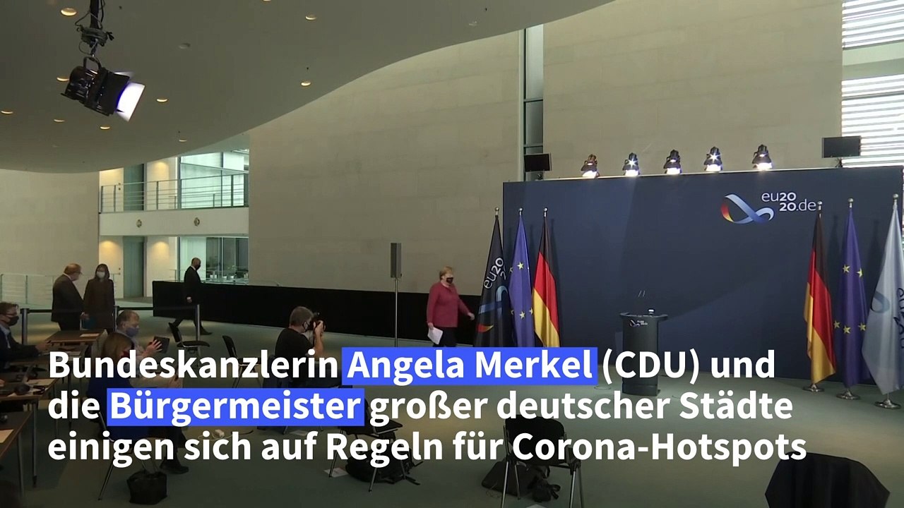 Merkel und Bürgermeister vereinbaren Beschränkungen für Corona-Hotspots