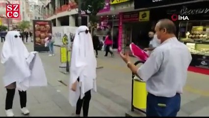 Hayalet kılığında korona virüse dikkat çektiler