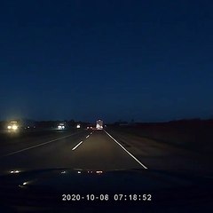 Flaming Tire Crosses Median and Clips Semi