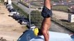 Guy Slides on Water Slide While Doing Handstand