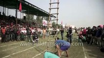 Man lifts ladder with his mouth - It happens only in India