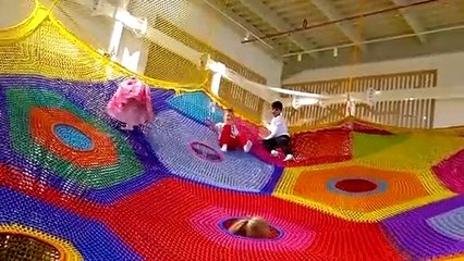 Diana and Roma Playing at a Children's Museum