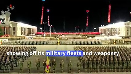 North Korea shows off giant missiles at huge military parade