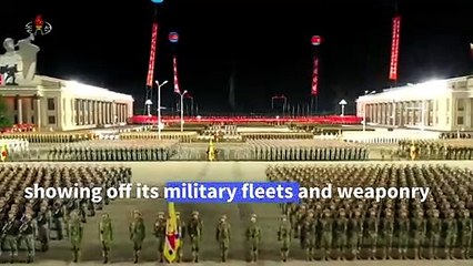 Tải video: North Korea shows off giant missiles at huge military parade