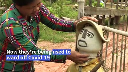 Cambodians use scarecrows to ward off coronavirus