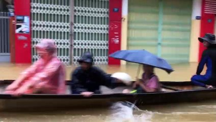 Images of Vietnam flood that has killed at least 18 people