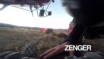 Helicopter drops water to extinguish the fire at Moraga Hills