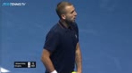 Wawrinka survives match points to beat Evans