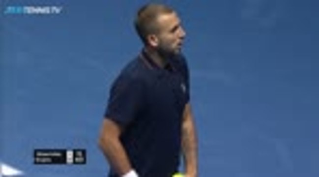 Wawrinka survives match points to beat Evans