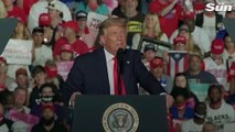 Trump offers to KISS Florida rally crowd and tosses Covid masks