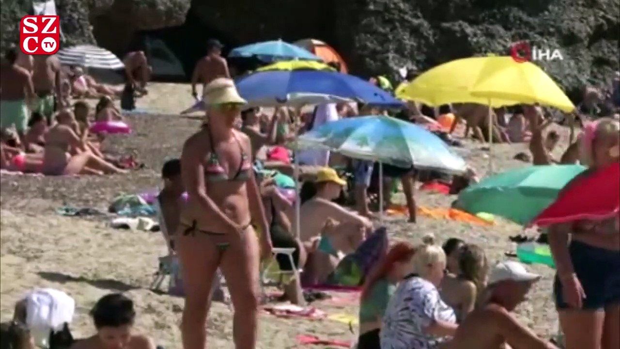Hava ve deniz suyu sıcaklığı eşitlendi, tatilciler soluğu plajda aldı