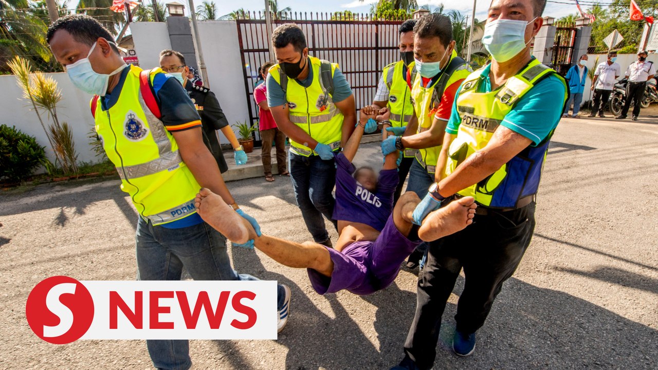 Baby murder probe: Father carried into court after refusing to cooperate