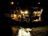 Retour d'un bateau de pêche le soir à Trouville