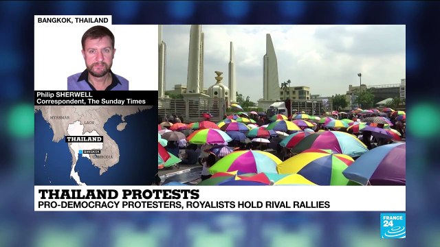 Thai democracy protesters march despite police, rival groups