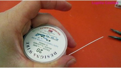 COMO HACER UN ANILLO DE LA LETRA E CON ALAMBRE