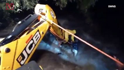 Must-see Video! Man Dangling From a JCB is Rescued by Hero