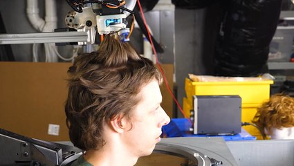 This robot can cut your hair and make small talk