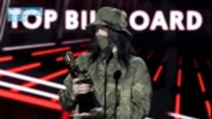 Billie Eilish Posts Racy Photo to Hit Back at Body-Shamers | Billboard News