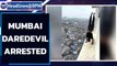 Mumbai daredevil arrested for handstand on high rise | Oneindia News
