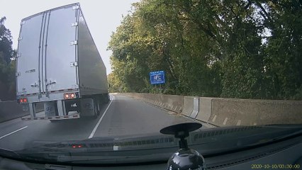 Tailgating Car Swerves into Semi
