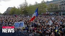 Thousands gather in Paris in memory of murdered teacher