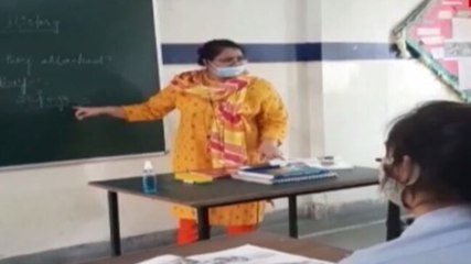 Images of the day: Senior students return to schools; Assam doctor's dance goes viral