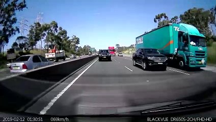 White SUV Flips Over onto Vehicle on Freeway