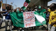 Waving flags, they sang Nigeria’s anthem. Then they were shot at