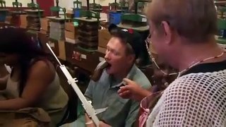 Conan O'Brien working at a Cuban cigar factory