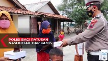 Polisi Bagi Ratusan Nasi Kotak Tiap Kamis