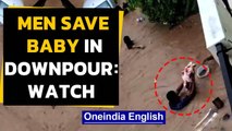 Bengaluru rains: Viral video shows men rescue baby | Oneindia News