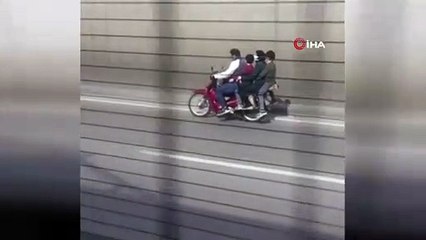 Bursa'da tehlikeli yolculuk! 5 kişi aynı motosiklette
