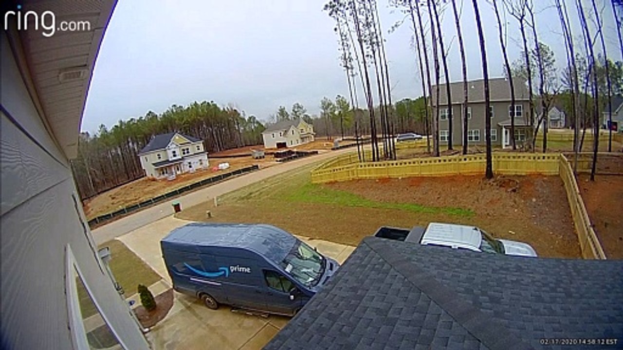 Amazon Driver Leaves Van in Drive and Runs into House Then Flees