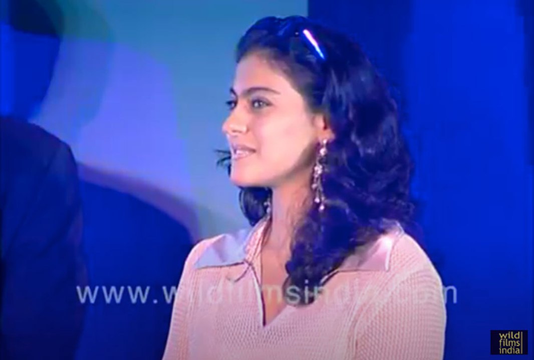 Kajol (so much younger!) and Ajay Devgan as bra...