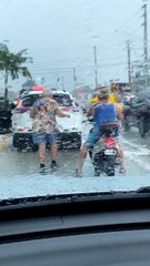 Older Lady Gives Motorcyclist Rain Coat During Storm
