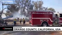 Firefighters battle out-of-control blazes in southern California