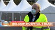 Coronavirus: Nurses with COVID-19 asked to carry on working at under pressure hospital in Belgium