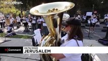 Israel Philharmonic Orchestra performs outside Knesset to protest COVID-19 lockdown measures