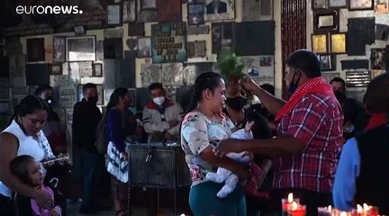 Guatemalans make offerings to folk hero San Simon for COVID protection