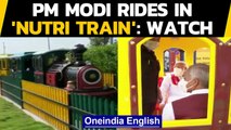 PM Modi rides in 'Nutri Train' at 'Arogya Van' in Gujarat' Kevadia: Watch | Oneindia News