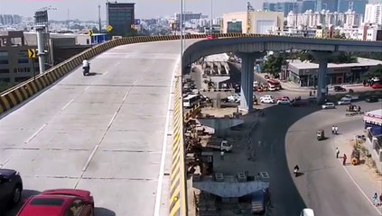 Car falls off a bridge in Hyderabad
