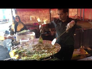 Delicious tawa chicken in Eid Festival, Sydney. Watch interesting report with Aurangzeb Baig