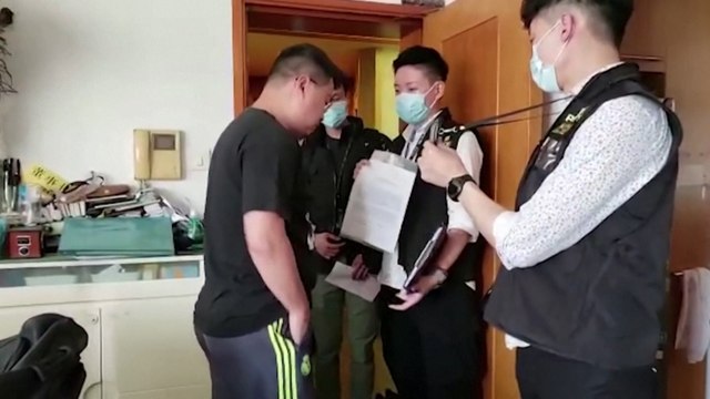 Eight Hong Kong lawmakers, activists arrested over chaotic Legislative Council meeting