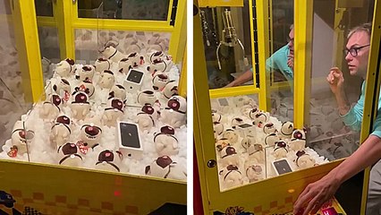 Attraper un iPhone dans une machine à pince